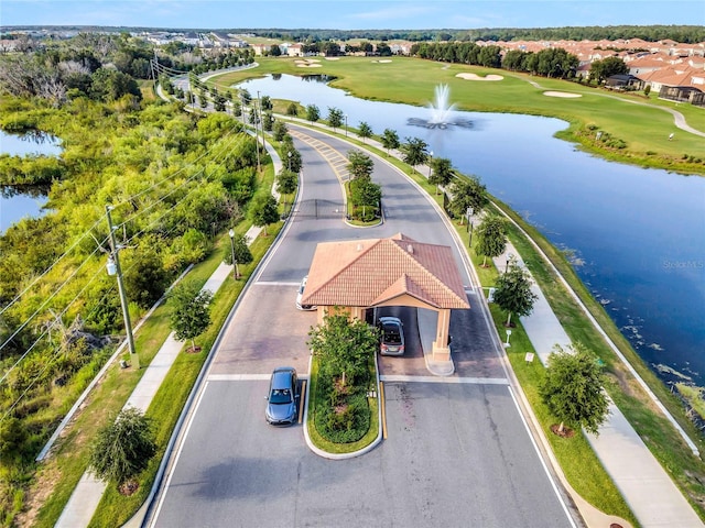 aerial view with a water view and golf course view