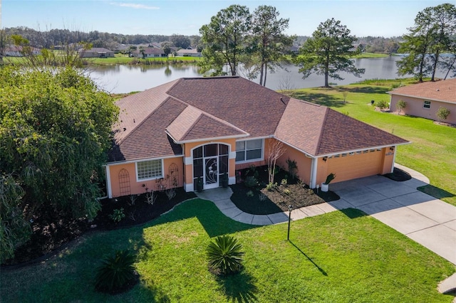 bird's eye view with a water view