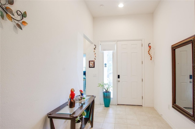 entrance foyer featuring light tile patterned floors