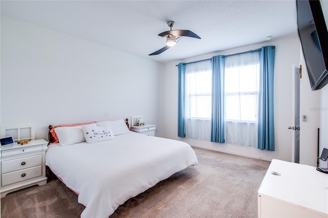 bedroom with carpet flooring and a ceiling fan