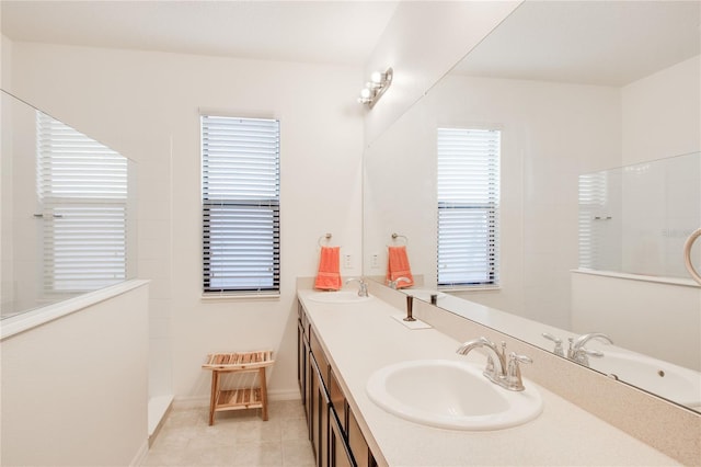 full bath with tile patterned flooring, walk in shower, and a sink