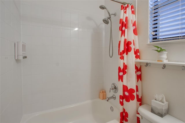 full bath featuring toilet and shower / bath combo with shower curtain