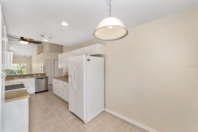 kitchen featuring white cabinetry, white refrigerator with ice dispenser, visible vents, and dishwasher