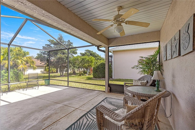 sunroom / solarium with ceiling fan