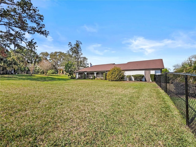 view of yard with fence