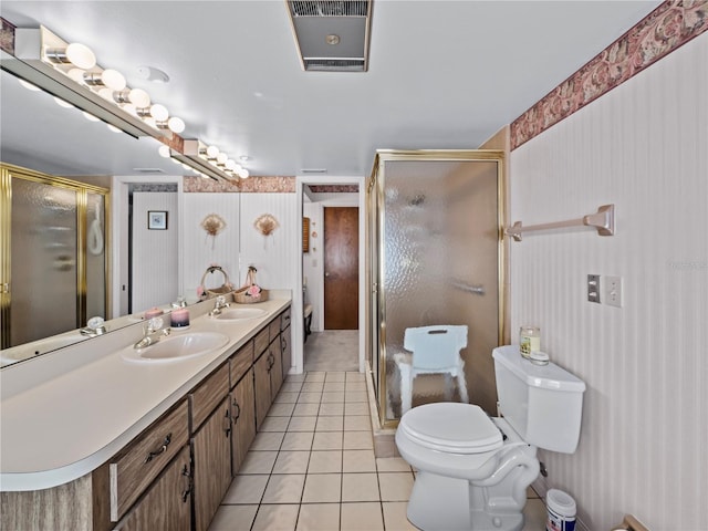 full bathroom with visible vents, a sink, and tile patterned floors