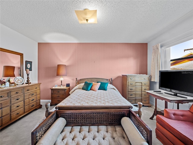 carpeted bedroom with a textured ceiling