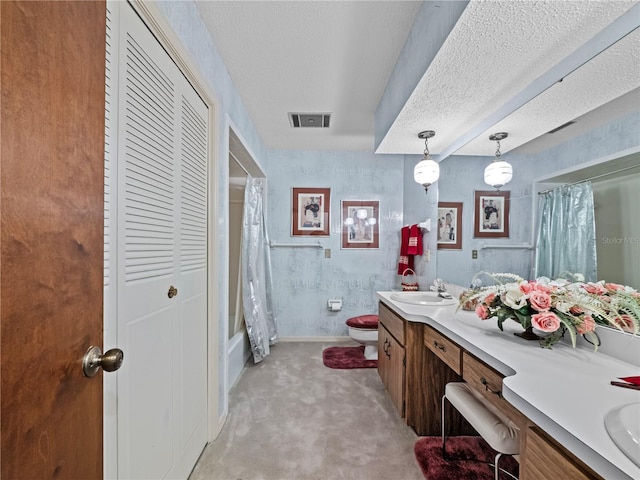 full bathroom featuring a textured ceiling, toilet, visible vents, a closet, and double vanity