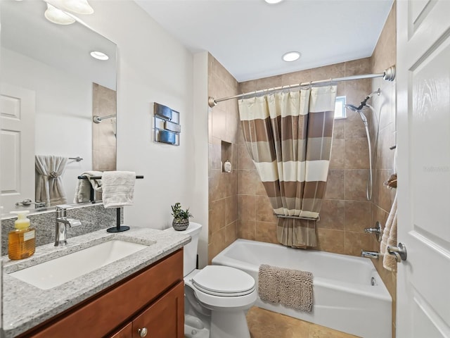 bathroom with toilet, shower / bathtub combination with curtain, and vanity