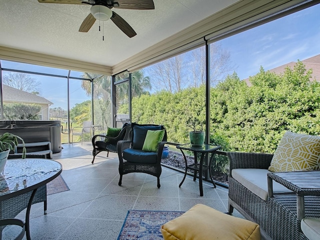 sunroom / solarium with ceiling fan