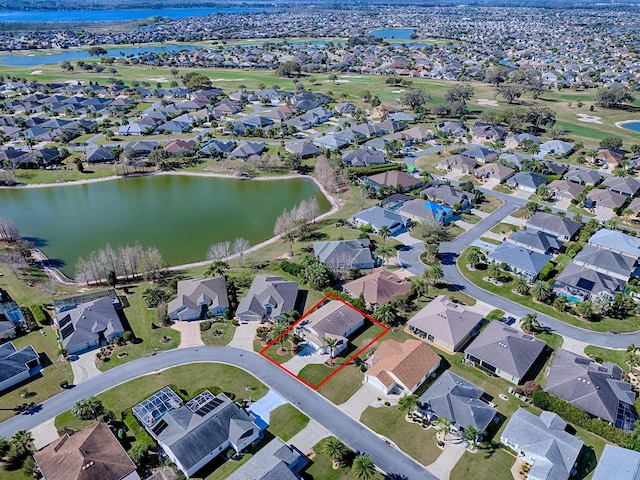 aerial view featuring a water view and a residential view