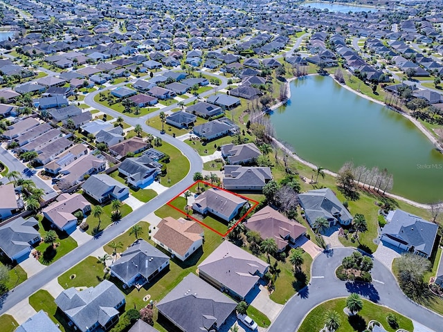 aerial view featuring a water view and a residential view