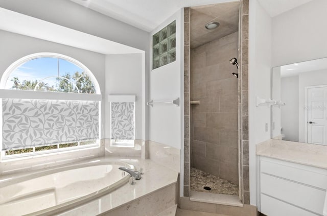 bathroom featuring tiled shower and a bath