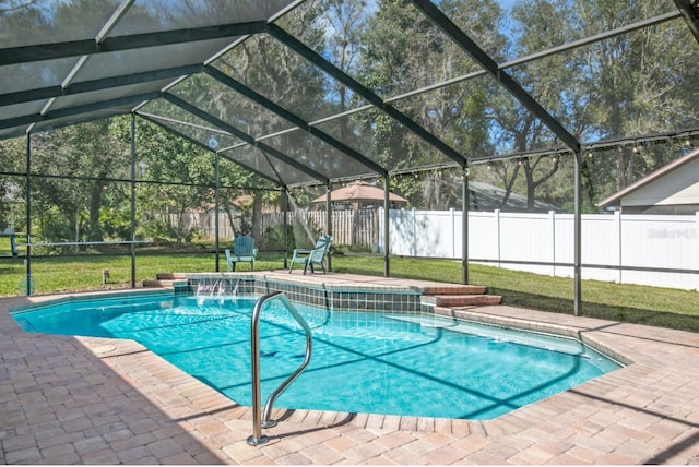 view of pool featuring a patio area, a fenced backyard, a fenced in pool, and a lanai