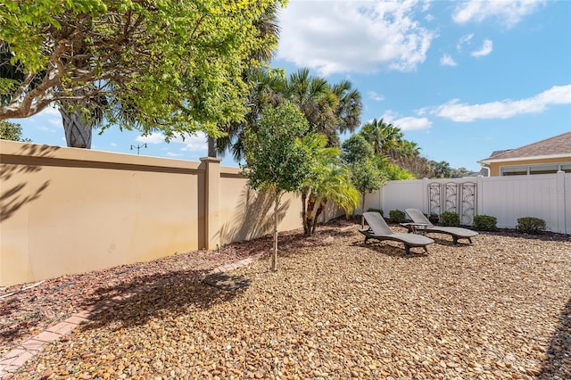 view of yard featuring a fenced backyard