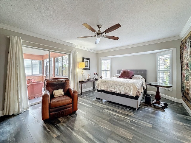 bedroom with baseboards, multiple windows, wood finished floors, and crown molding