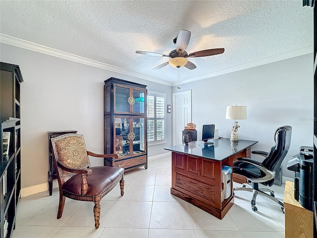 office area with light tile patterned floors, baseboards, ceiling fan, a textured ceiling, and crown molding