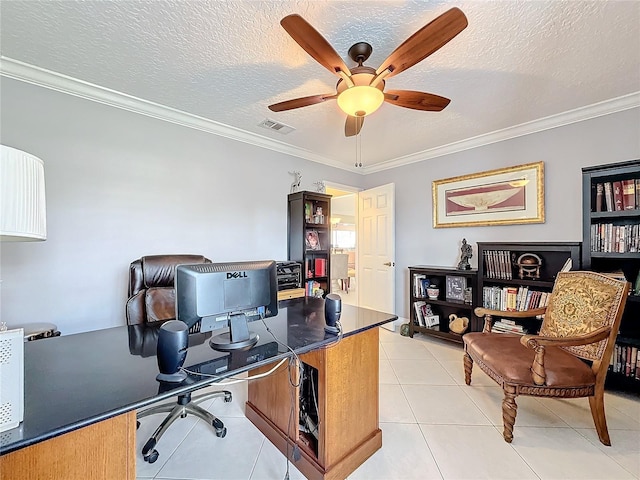 home office featuring light tile patterned floors, a textured ceiling, visible vents, a ceiling fan, and crown molding