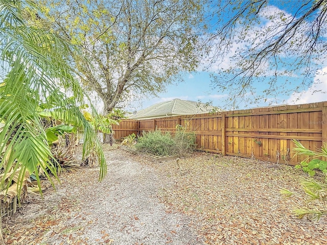 view of yard featuring a fenced backyard