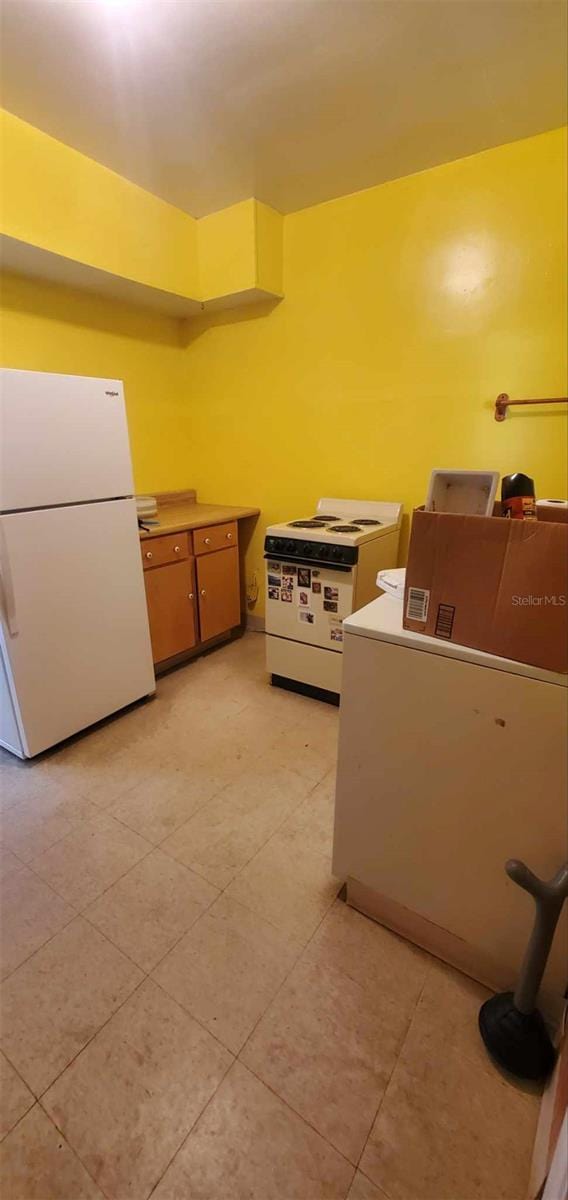 kitchen featuring white appliances