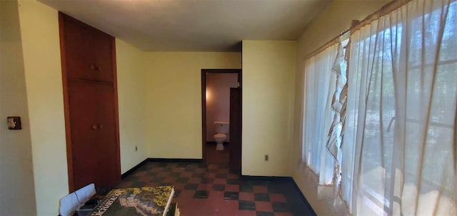 bedroom featuring a closet and tile patterned floors