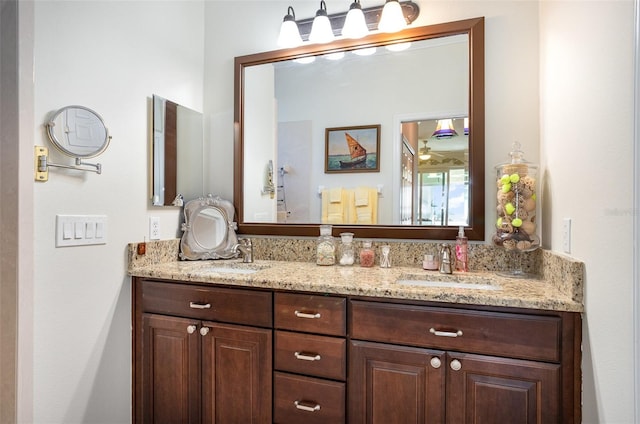 bathroom with double vanity and a sink