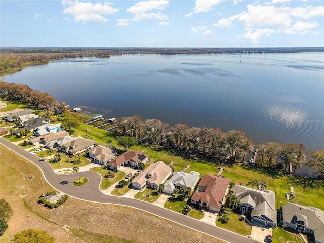 aerial view featuring a water view and a residential view