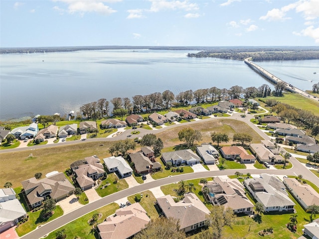 aerial view with a water view and a residential view