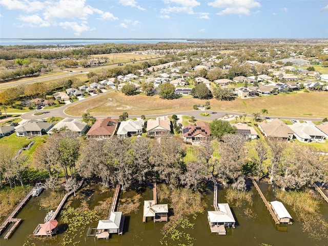 aerial view with a water view and a residential view