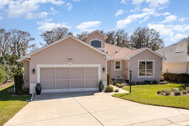 ranch-style house featuring concrete driveway, an attached garage, a front lawn, and stucco siding