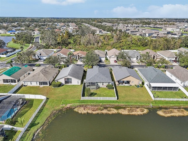 aerial view with a water view and a residential view