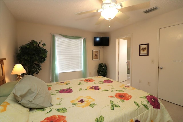 bedroom with visible vents and ceiling fan