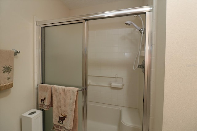 bathroom featuring a stall shower