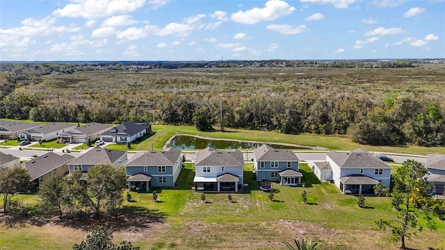 birds eye view of property with a residential view