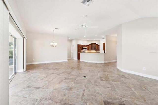 unfurnished living room featuring recessed lighting, visible vents, baseboards, and ceiling fan with notable chandelier