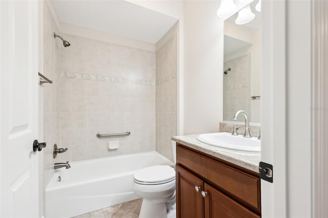 full bathroom featuring toilet, tile patterned flooring, bathtub / shower combination, and vanity