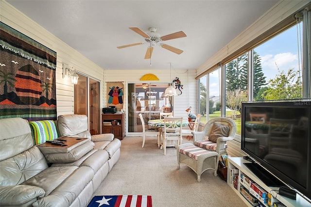 sunroom / solarium with ceiling fan