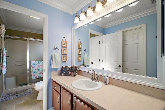 full bath with toilet, vanity, tile patterned floors, a stall shower, and crown molding