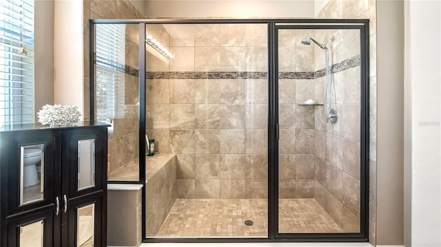 26747 White Plains Way, Leesburg, FL 34748 - bathroom featuring a shower stall and toilet