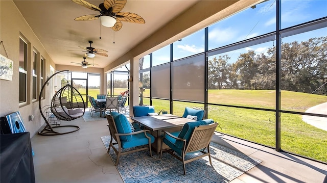 26747 White Plains Way, Leesburg, FL 34748 - sunroom with outdoor dining space and a ceiling fan