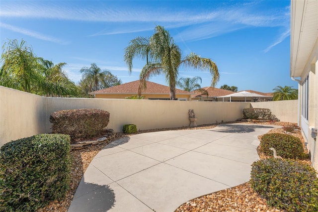 1202 San Bernardo Rd, The Villages, FL 32162 - view of patio with a fenced backyard