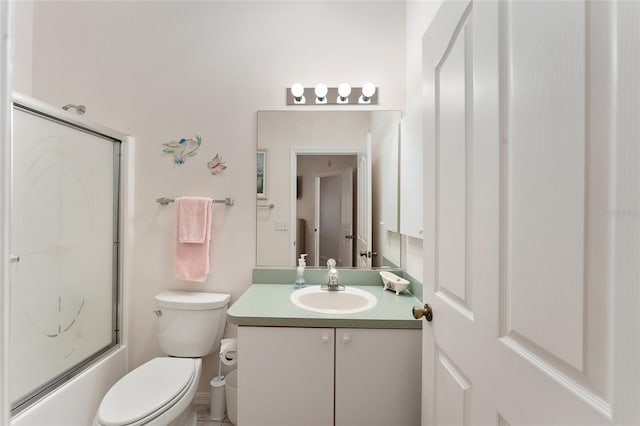 1202 San Bernardo Rd, The Villages, FL 32162 - full bathroom with combined bath / shower with glass door, vanity, and toilet