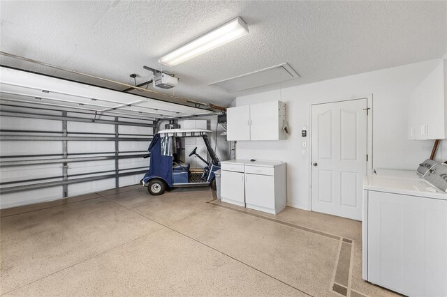1202 San Bernardo Rd, The Villages, FL 32162 - garage featuring separate washer and dryer and a garage door opener