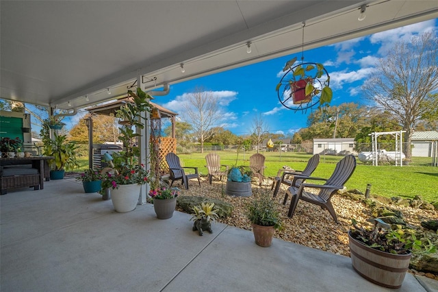 view of patio / terrace with fence