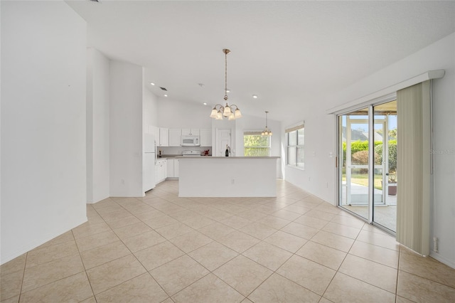 interior space featuring lofted ceiling, light tile patterned floors, recessed lighting, and an inviting chandelier