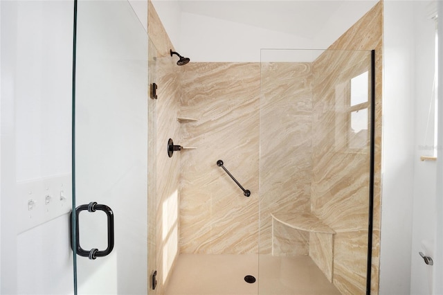 bathroom with a shower stall