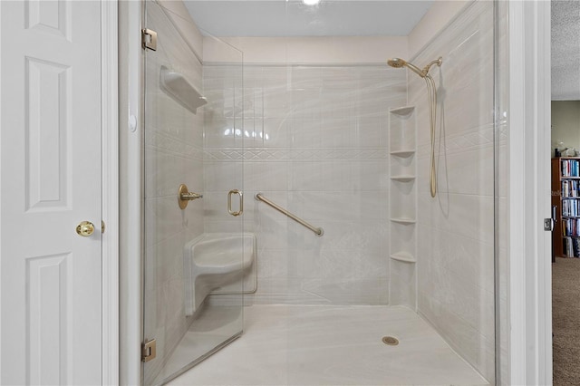 full bath with a shower stall