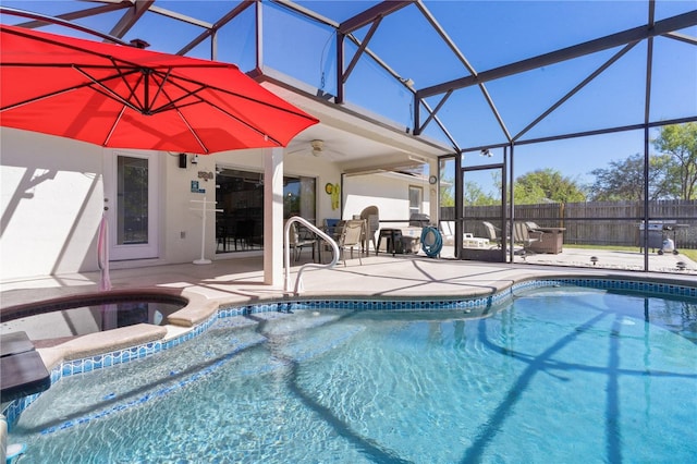 view of swimming pool with a fenced in pool, ceiling fan, an in ground hot tub, fence, and a patio area