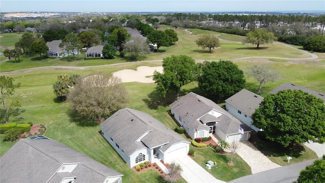 drone / aerial view featuring a residential view and view of golf course