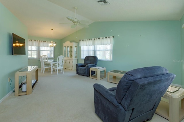 sitting room featuring lofted ceiling, ceiling fan with notable chandelier, carpet floors, visible vents, and baseboards